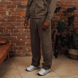 <transcy>Graue, zulaufende Jogginghose</transcy>